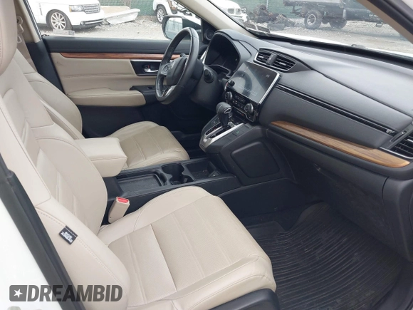 2019 Honda CR-V EX-L with VIN 2HKRW2H88KH670476, listed as a IAAI auction lot 42037439 with 36,664 mi miles and . Bid and sale history available at carsss.com. Image 5.