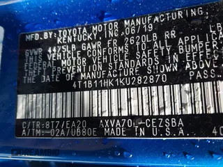 2019 Toyota Camry LE z VIN 4T1B11HK1KU282870, wystawiony jako IAAI lot #41799625 z przebiegiem 63 977 mil mil oraz . Historia ofert i sprzedaży dostępna na DreamBid. Obrazek 9.