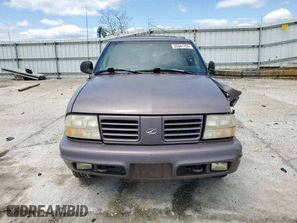 1998 Oldsmobile Bravada z VIN 1GHDT13W9W2718457, wystawiony jako Copart lot #55341755 z przebiegiem 133 968 mil mil oraz Tytuł czysty. Historia ofert i sprzedaży dostępna na DreamBid. Obrazek 5.