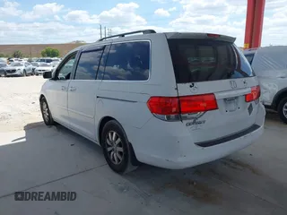 2009 Honda Odyssey EX-L with VIN 5FNRL386X9B056552, listed as a IAAI auction lot 42126144 with 194,722 mi miles. Bid and sale history available at carsss.com. Image 3.