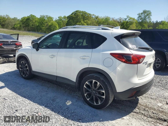 2016 Mazda CX-5 Grand Touring with VIN JM3KE4DY0G0819528, listed as a Copart auction lot 52343885 with 77,340 mi miles and Clean Title. Bid and sale history available at DreamBid. Image 2.