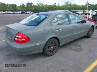 2003 Mercedes-Benz E-Class 3.2L with VIN WDBUF65J83A124342, listed as a IAAI auction lot 41951596 with 185,094 mi miles. Bid and sale history available at carsss.com. Image 4.
