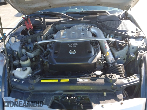 2003 Nissan 350Z Touring z VIN JN1AZ34E23T019866, wystawiony jako IAAI lot #41293510 z przebiegiem 118 416 mil mil oraz . Historia ofert i sprzedaży dostępna na DreamBid. Obrazek 10.