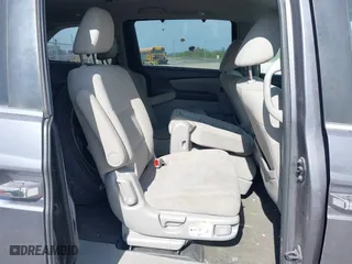 2016 Honda Odyssey SE with VIN 5FNRL5H3XGB043251, listed as a IAAI auction lot 42050805 with 156,537 mi miles. Bid and sale history available at carsss.com. Image 8.