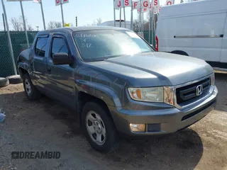 2011 Honda Ridgeline RT z VIN 5FPYK1F26BB453191, wystawiony jako IAAI lot #41776280 z przebiegiem 122 908 mil mil oraz . Historia ofert i sprzedaży dostępna na DreamBid. Obrazek 1.