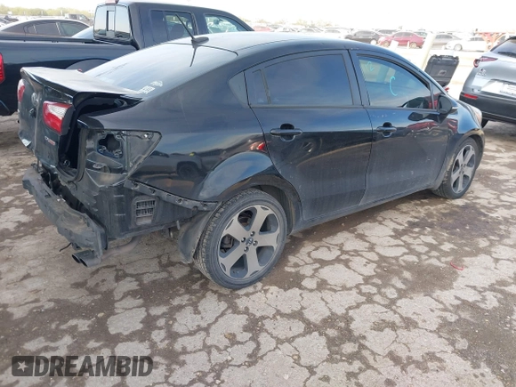 2013 Kia Rio EX with VIN KNADN4A33D6206917, listed as a IAAI auction lot 41049490 with 188,281 mi miles and . Bid and sale history available at DreamBid. Image 4.