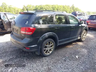 2013 Dodge Journey R/T with VIN 3C4PDDEG4DT691056, listed as a IAAI auction lot 42535196 with 198,307 mi miles and . Bid and sale history available at DreamBid. Image 4.