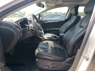 2014 Ford Fusion Titanium с VIN 3FA6P0K90ER363283, выставлен на аукционе Copart как лот 55156795 с пробегом 54 099 миль миль и Списание • Salvage title. История ставок и продаж доступна на DreamBid. Изображение 7.