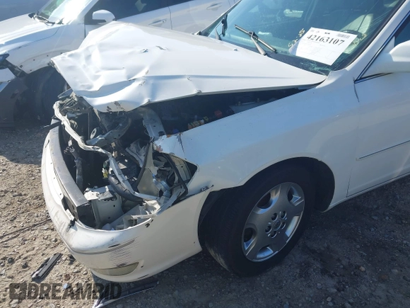 2004 Toyota Avalon XL z VIN 4T1BF28BX4U343188, wystawiony jako IAAI lot #42163107 z przebiegiem Nie podano mil oraz . Historia ofert i sprzedaży dostępna na DreamBid. Obrazek 6.