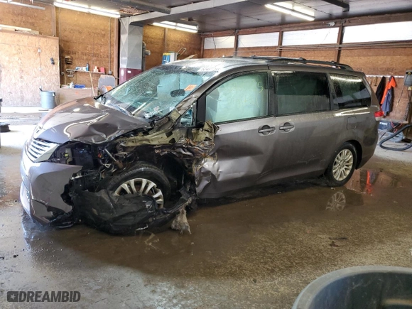 2012 Toyota Sienna XLE AAS with VIN 5TDYK3DC6CS263811, listed as a Copart auction lot 52485765 with 0 mi miles and Salvage Title. Bid and sale history available at carsss.com. Image 1.