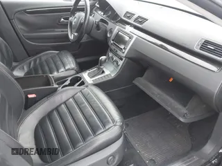 2014 Volkswagen CC Lux with VIN WVWRP7AN3EE537770, listed as a IAAI auction lot 41385247 with 135,069 mi miles. Bid and sale history available at carsss.com. Image 5.