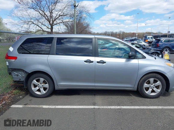 2013 Toyota Sienna L with VIN 5TDZK3DC9DS298333, listed as a IAAI auction lot 41941011 with 141,021 mi miles. Bid and sale history available at carsss.com. Image 13.