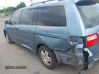 2005 Honda Odyssey EX with VIN 5FNRL38435B101887, listed as a IAAI auction lot 42704893 with 185,137 mi miles and . Bid and sale history available at DreamBid. Image 6.
