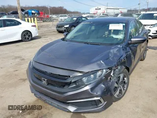 2019 Honda Civic LX with VIN 19XFC2F61KE037495, listed as a IAAI auction lot 41891007 with 90,262 mi miles and . Bid and sale history available at DreamBid. Image 17.