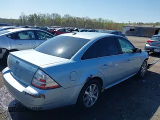 2008 Ford Taurus SEL with VIN 1FAHP24WX8G186437, listed as a IAAI auction lot 41934754 with 186,347 mi miles. Bid and sale history available at carsss.com. Image 4.