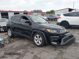 2020 Jeep Compass Latitude with VIN 3C4NJCBB7LT224859, listed as a IAAI auction lot 41727777 with 63,313 mi miles and . Bid and sale history available at carsss.com. Image 1.