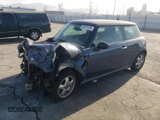 2010 MINI Hardtop with VIN WMWMF3C51ATU78255, listed as a Copart auction lot 43473125 with Not Provided miles and Salvage Title. Bid and sale history available at DreamBid. Image 1.