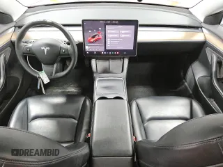 2023 Tesla Model 3 with VIN 5YJ3E1EA3PF452543, listed as a Copart auction lot 55481425 with 97,399 mi miles and Clean Title. Bid and sale history available at DreamBid. Image 8.