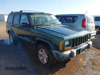 1999 Jeep Cherokee Sport with VIN 1J4FT68S6XL579735, listed as a IAAI auction lot 41484413 with 146,862 mi miles. Bid and sale history available at carsss.com. Image 1.