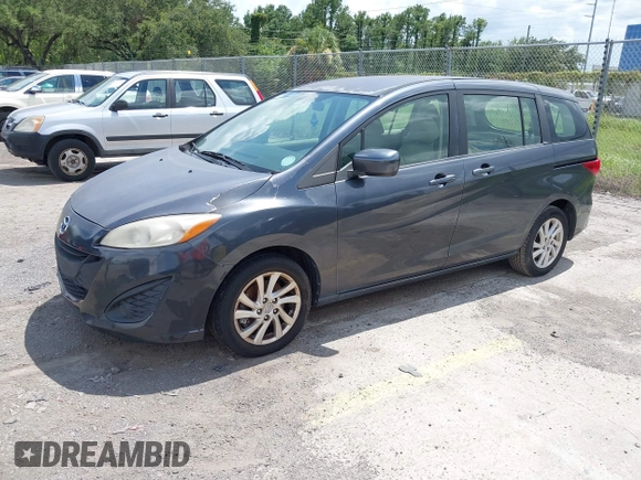 2012 Mazda 5 Sport with VIN JM1CW2BL8C0131745, listed as a IAAI auction lot 42625411 with 194,875 mi miles and . Bid and sale history available at DreamBid. Image 2.