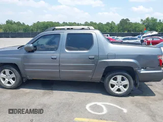 2013 Honda Ridgeline RTL with VIN 5FPYK1F5XDB012354, listed as a IAAI auction lot 42392921 with 248,223 mi miles and . Bid and sale history available at DreamBid. Image 14.
