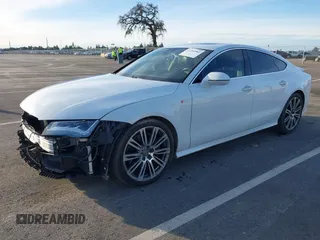 2013 Audi A7 Prestige with VIN WAU3GAFC0DN090191, listed as a IAAI auction lot 41209982 with 138,578 mi miles and . Bid and sale history available at DreamBid. Image 2.