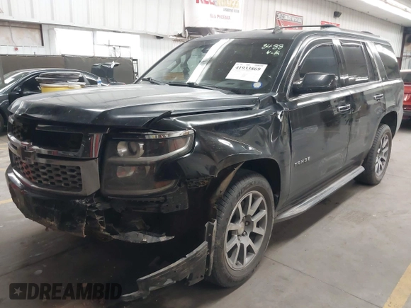 2015 Chevrolet Tahoe LT z VIN 1GNSCBKC1FR228488, wystawiony jako IAAI lot #41933869 z przebiegiem 164 523 mil mil oraz . Historia ofert i sprzedaży dostępna na DreamBid. Obrazek 18.
