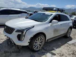 2023 Cadillac XT4 AWD Premium Luxury with VIN 1GYFZDR46PF130198, listed as a Copart auction lot 57763285 with 8,346 mi miles and Salvage title. Bid and sale history available at DreamBid. Image 1.