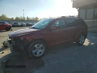 2009 Dodge Journey SXT with VIN 3D4GG57V19T150405, listed as a Copart auction lot 70817743 with 142,969 mi miles and Salvage Title. Bid and sale history available at carsss.com. Image 1.
