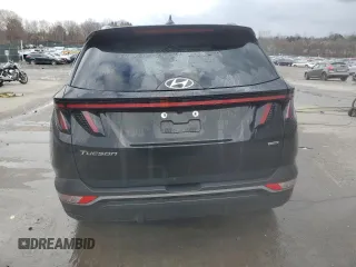 2023 Hyundai Tucson SEL with VIN 5NMJBCAE2PH270674, listed as a Copart auction lot 82879614 with 11,673 mi miles and Salvage Title. Bid and sale history available at DreamBid. Image 6.