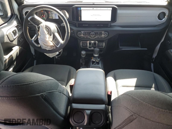 2024 Jeep Wrangler Sahara with VIN 1C4PJXEN7RW297948, listed as a Copart auction lot 54656795 with 12,292 mi miles and Salvage title. Bid and sale history available at DreamBid. Image 8.
