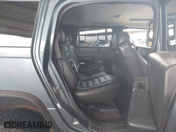 2005 Hummer H2 SUV with VIN 5GRGN23U25H107505, listed as a IAAI auction lot 41703768 with 213,723 mi miles. Bid and sale history available at carsss.com. Image 8.