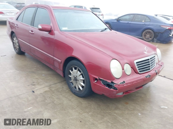 2000 Mercedes-Benz E-Class with VIN WDBJF65J1YB113770, listed as a IAAI auction lot 41462464 with 157,279 mi miles. Bid and sale history available at carsss.com. Image 6.