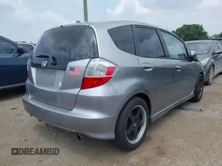 2009 Honda Fit Sport with VIN JHMGE88489S048254, listed as a IAAI auction lot 42173309 with 160,055 mi miles. Bid and sale history available at carsss.com. Image 4.