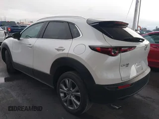 2023 Mazda CX-30 2.5 S Carbon Edition with VIN 3MVDMBCM9PM584887, listed as a IAAI auction lot 41571659 with 33,667 mi miles. Bid and sale history available at carsss.com. Image 3.