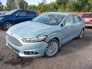 2014 Ford Fusion SE Hybrid with VIN 3FA6P0LU2ER168949, listed as a IAAI auction lot 40366468 with 188,802 mi miles. Bid and sale history available at carsss.com. Image 2.