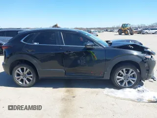 2022 Mazda CX-30 S Select z VIN 3MVDMBBL7NM413447, wystawiony jako IAAI lot #41772804 z przebiegiem 69 102 mil mil oraz . Historia ofert i sprzedaży dostępna na DreamBid. Obrazek 13.