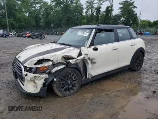 2017 MINI Hardtop 4 Door Cooper with VIN WMWXU1C53H2E18584, listed as a Copart auction lot 61355915 with 56,171 mi miles and Salvage title. Bid and sale history available at DreamBid. Image 1.