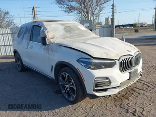2021 BMW X5 sDrive40i with VIN 5UXCR4C05M9G12770, listed as a IAAI auction lot 41411950 with 1 mi miles. Bid and sale history available at carsss.com. Image 1.