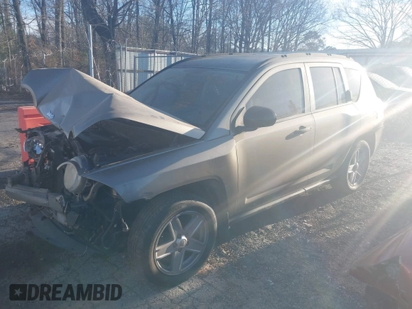 2007 Jeep Compass Sport with VIN 1J8FT47W57D158543, listed as a IAAI auction lot 41817636 with 241,439 mi miles. Bid and sale history available at carsss.com. Image 19.