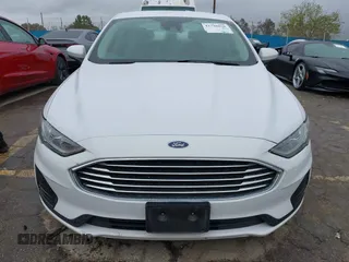 2020 Ford Fusion SE z VIN 3FA6P0LU2LR253612, wystawiony jako IAAI lot #41798850 z przebiegiem 58 219 mil mil oraz . Historia ofert i sprzedaży dostępna na DreamBid. Obrazek 12.