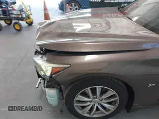 2015 Infiniti Q50 Premium with VIN JN1BV7AP4FM330386, listed as a IAAI auction lot 42028771 with 75,533 mi miles. Bid and sale history available at carsss.com. Image 6.