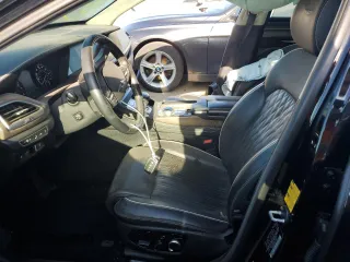 2020 Genesis G90 3.3T Premium with VIN KMTF34PAXLU078758, listed as a Copart auction lot 84002784 with 61,035 mi miles and Salvage Title. Bid and sale history available at carsss.com. Image 7.