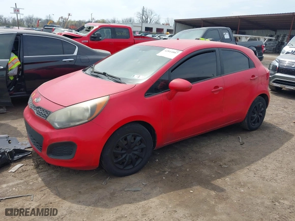 2013 Kia Rio LX with VIN KNADM5A32D6126632, listed as a IAAI auction lot 42014867 with 156,098 mi miles. Bid and sale history available at carsss.com. Image 2.