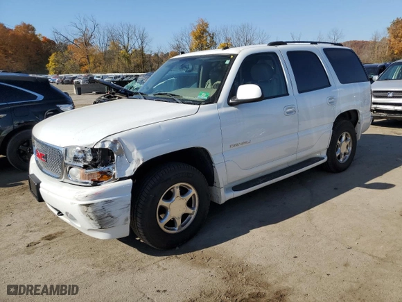 2005 GMC Yukon Denali with VIN 1GKEK63U75J163204, listed as a Copart auction lot 77300834 with 92,096 mi miles and Salvage Title. Bid and sale history available at carsss.com. Image 1.