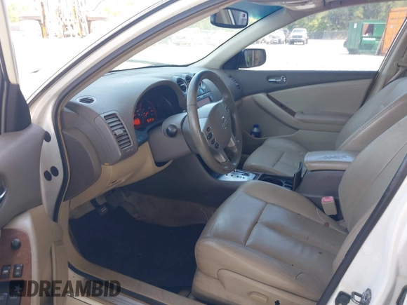 2007 Nissan Altima 2.5 with VIN 1N4AL21E77N491476, listed as a IAAI auction lot 42082834 with 284,079 mi miles. Bid and sale history available at carsss.com. Image 5.
