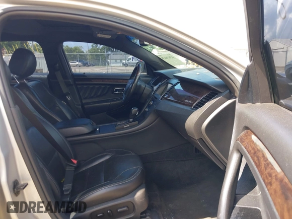 2015 Ford Taurus Limited with VIN 1FAHP2F83FG202733, listed as a IAAI auction lot 42616638 with 146,197 mi miles and . Bid and sale history available at DreamBid. Image 5.