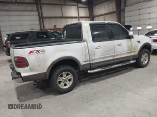 2002 Ford F-150 XLT with VIN 1FTRW08L02KE16948, listed as a IAAI auction lot 41881612 with 168,471 mi miles. Bid and sale history available at carsss.com. Image 4.