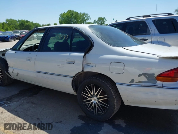 1993 Pontiac Bonneville SE z VIN 1G2HX53L8P1281104, wystawiony jako IAAI lot #42219547 z przebiegiem 113 292 mil mil oraz . Historia ofert i sprzedaży dostępna na DreamBid. Obrazek 6.