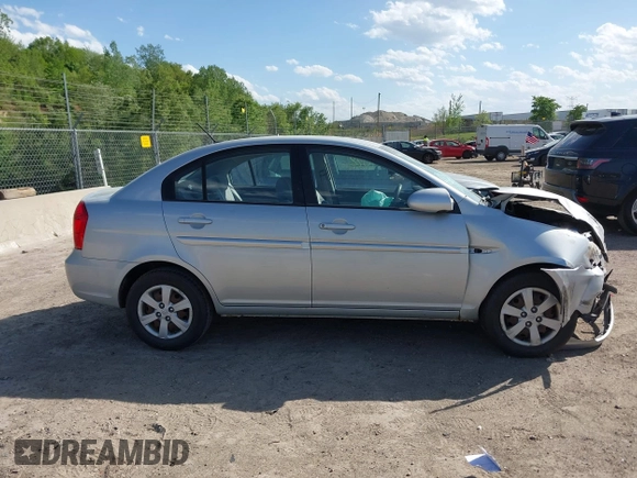 2009 Hyundai Accent Auto GLS z VIN KMHCN46C69U326197, wystawiony jako IAAI lot #42268198 z przebiegiem 74 308 mil mil oraz . Historia ofert i sprzedaży dostępna na DreamBid. Obrazek 13.